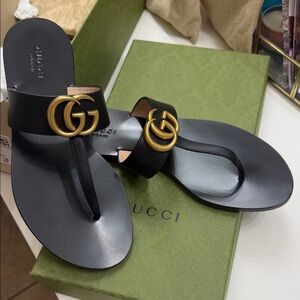 Gucci Women's Sandals in Black with Gold Accents